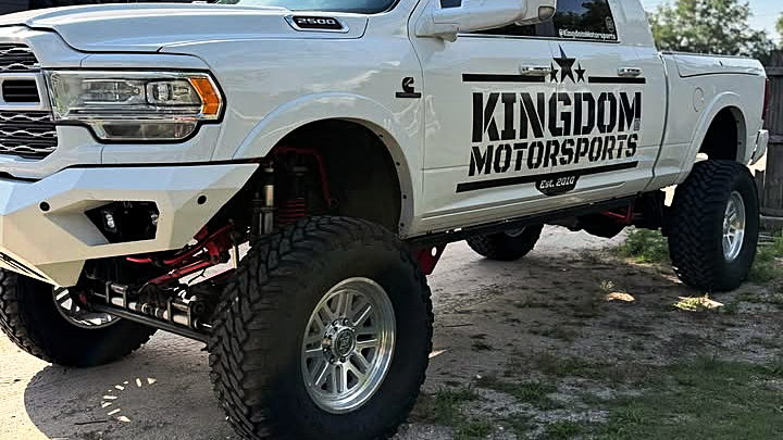 2019 RAM 2500 Mega Cab Limited build with a Bulletproof Suspension lift, front three-quarter view on the lot (vehicles-for-sale listing)